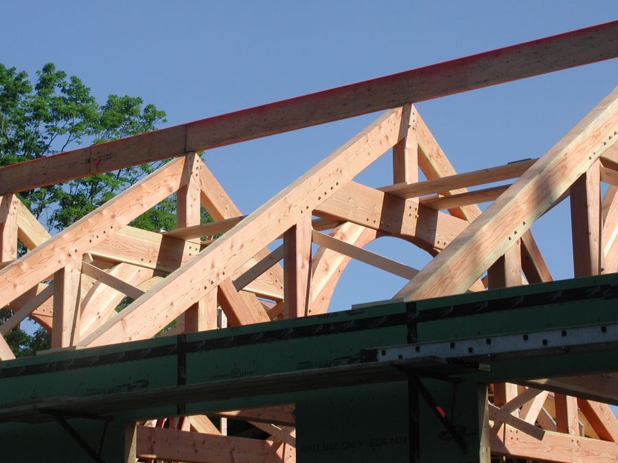 The type of truss varies depending on the structural needs of the particular building. This is a queenpost trust.