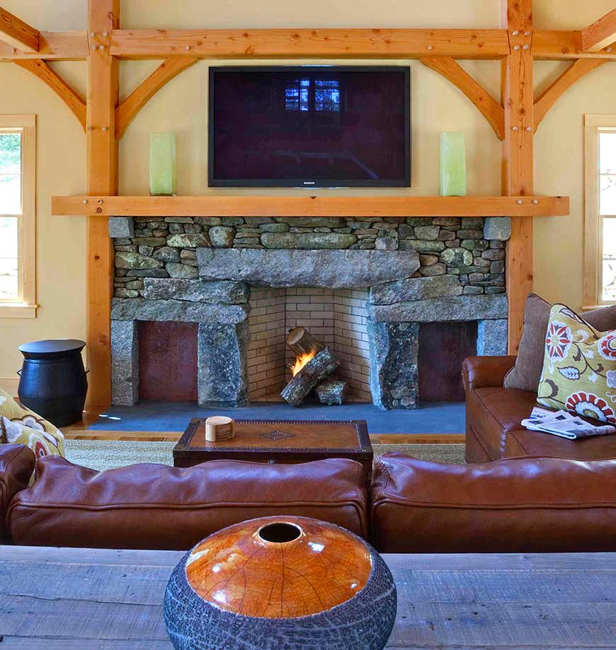 This photo of a timber framed living room shows traditional wooden joints with modern engineering.