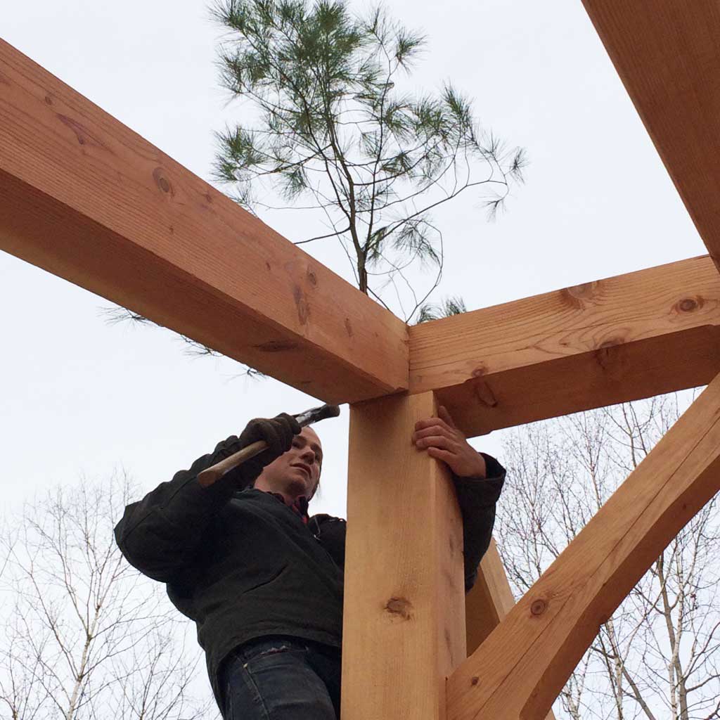 We follow the tradition of fastening a tree to the tallest point of the building.