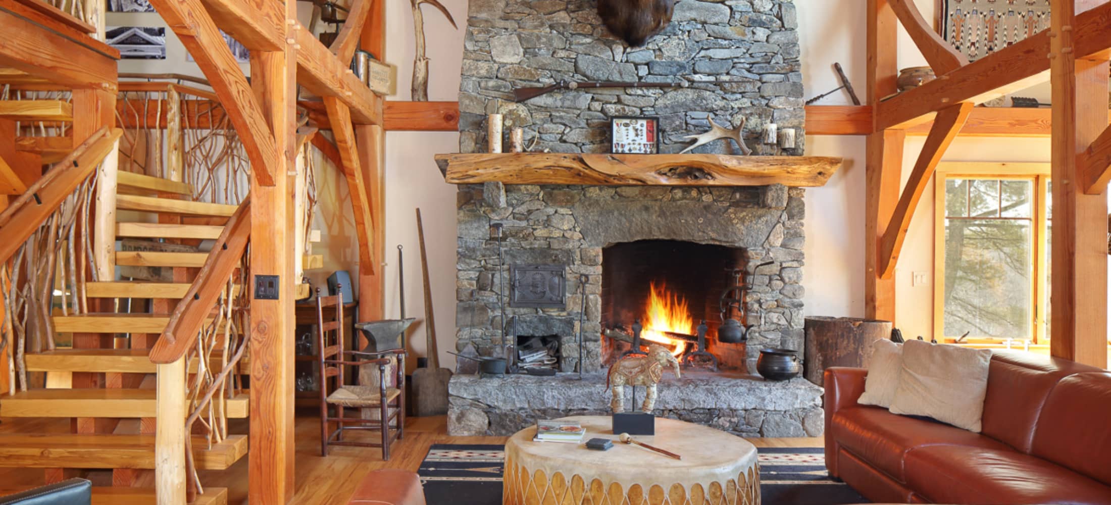 Cozy fireplace in timber frame home